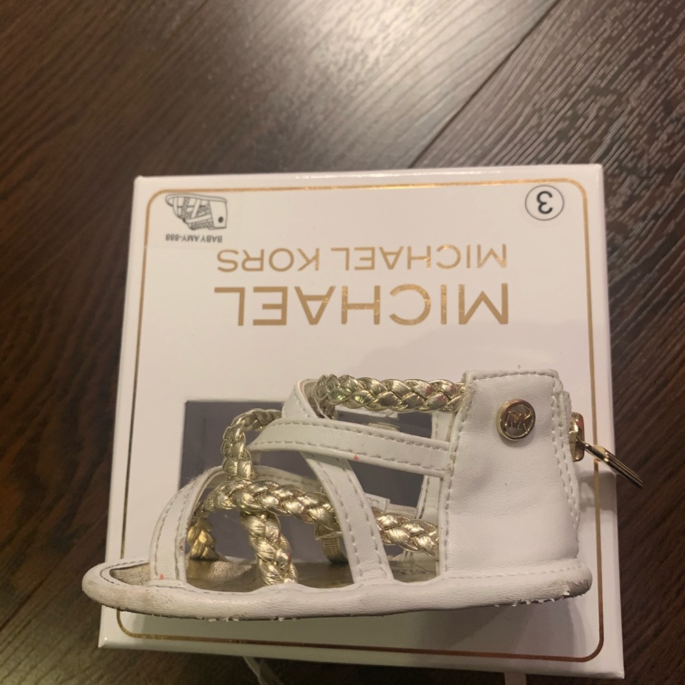 Baby Michael Kors sandals.